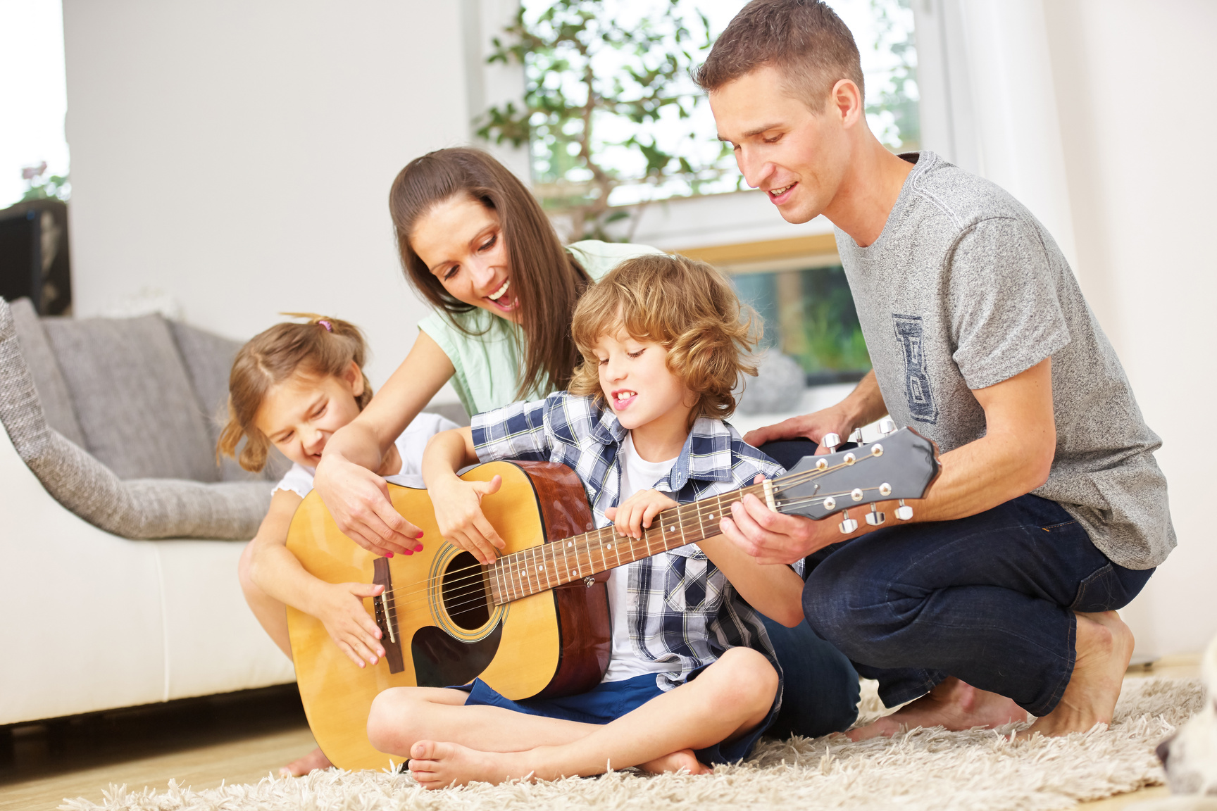 Parents and Children Playing Guitar
